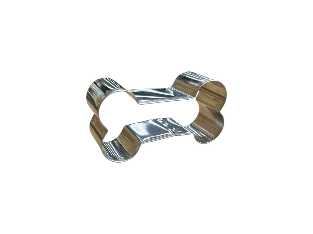 Metal bone-shaped cookie cutter from BarkyBakey baking kit.